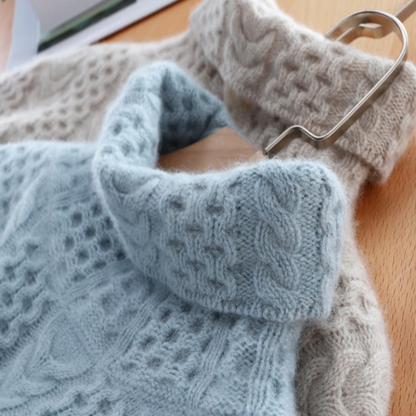 Jersey de cachemira de cuello alto con costuras